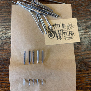 Universal domestic sewing machine needles